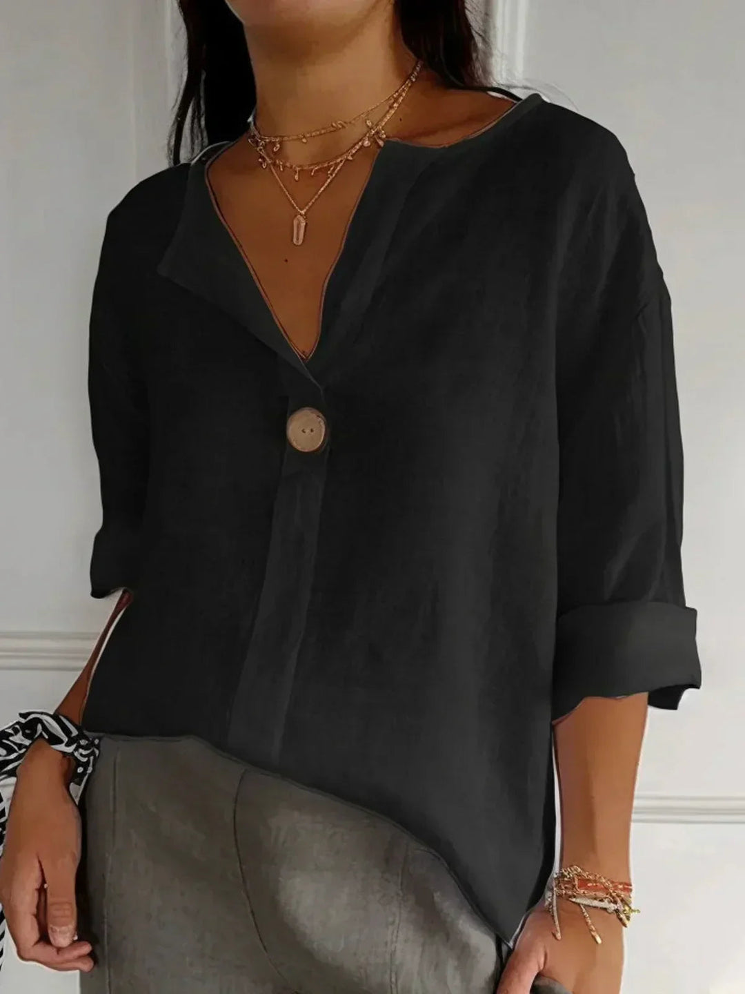 Vielseitiges Damen Blusen-Top mit V-Ausschnitt & lockerem Schnitt; perfekt für Casual Chic.