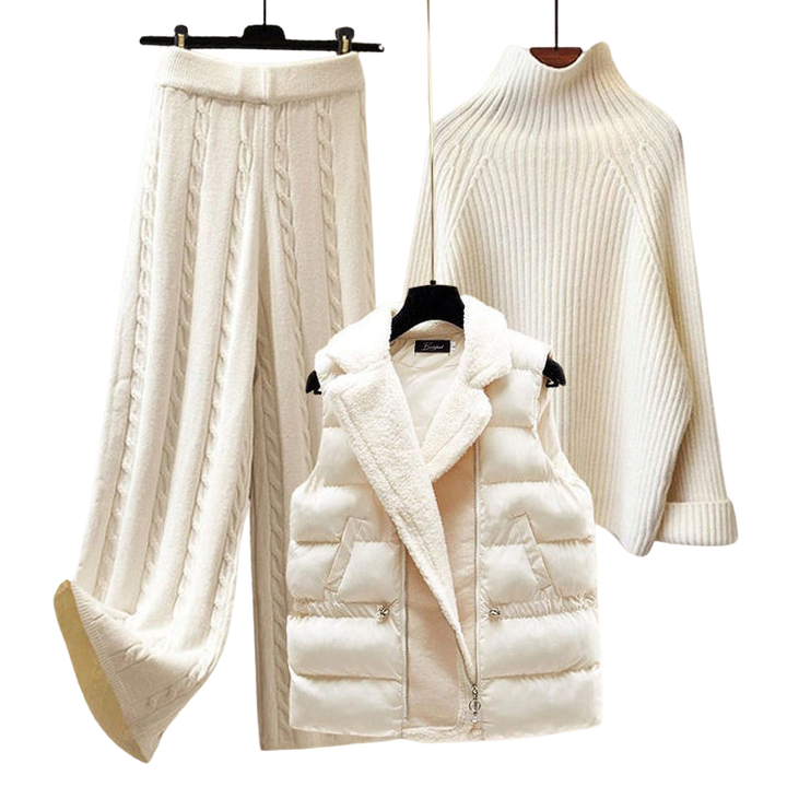 Komplettes dreiteiliges Winteroutfit für Damen: warmer Rollkragenpullover, Daunenjacke & Hose.