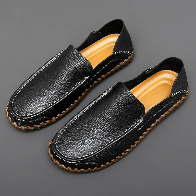 Komfortable Herren Slipper mit handgefertigten Details, Business Casual Look und strapazierfähiger Rutschsohle.