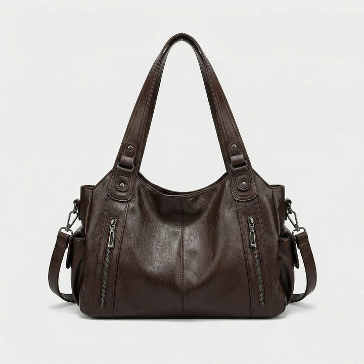 Stilvolle Alltagstasche Nikita für Damen in Hellbraun, als Crossover oder Schultertasche nutzbar.