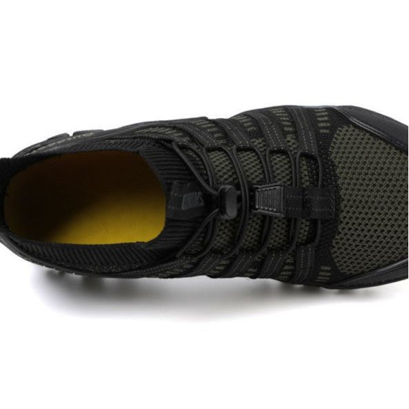 Seitliche Ansicht der Damen Wanderschuhe: elastisches Schnürsystem & rutschfeste Sohle für sicheren Halt beim Trekking.