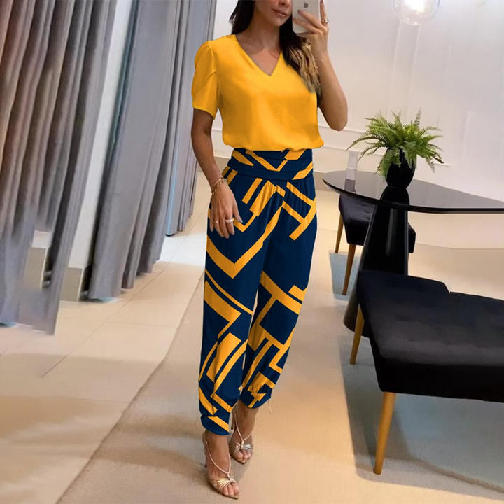 Vielseitiger Damen Jumpsuit mit elegantem Druck, perfekt als lockeres Tagesoutfit für Sommer und Herbst.