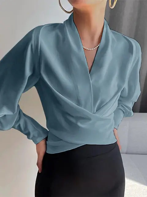 Elegante Damenbluse Elena mit V-Ausschnitt, modischen Puffärmeln und stilvollem Design für Frauen.
