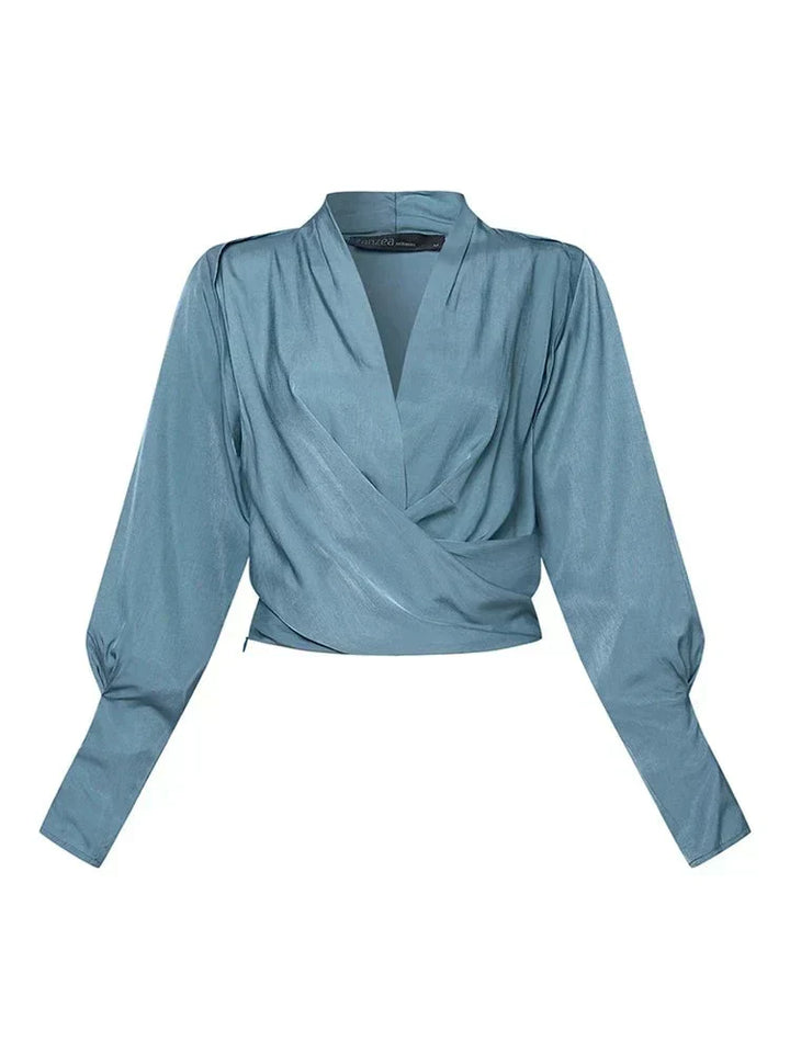 Stilvolle Damenbluse Elena mit V-Ausschnitt und femininen Puffärmeln, perfekt für Frühling und Sommer.