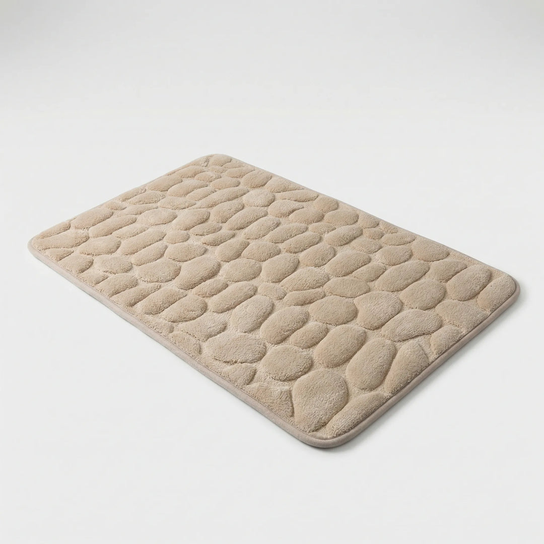 Duschmatte Drystone mit strukturierter Oberfläche im Kieseldesign & rutschfester Unterseite für Sicherheit.