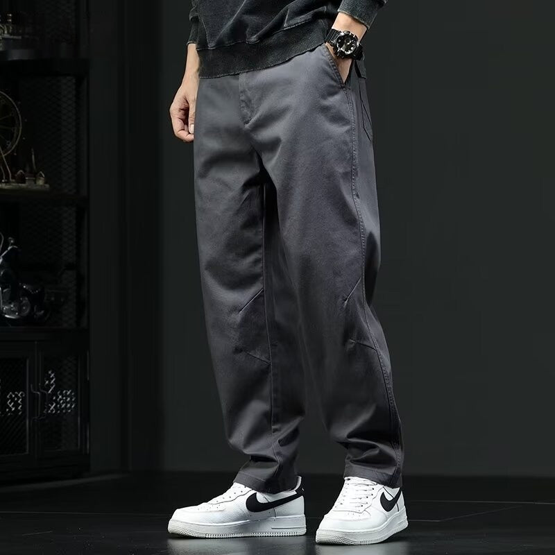 Streetwear Herrenhose, locker geschnitten, gerades Bein, mittelhoher Bund, unifarben Grau, ideal für Freizeit.