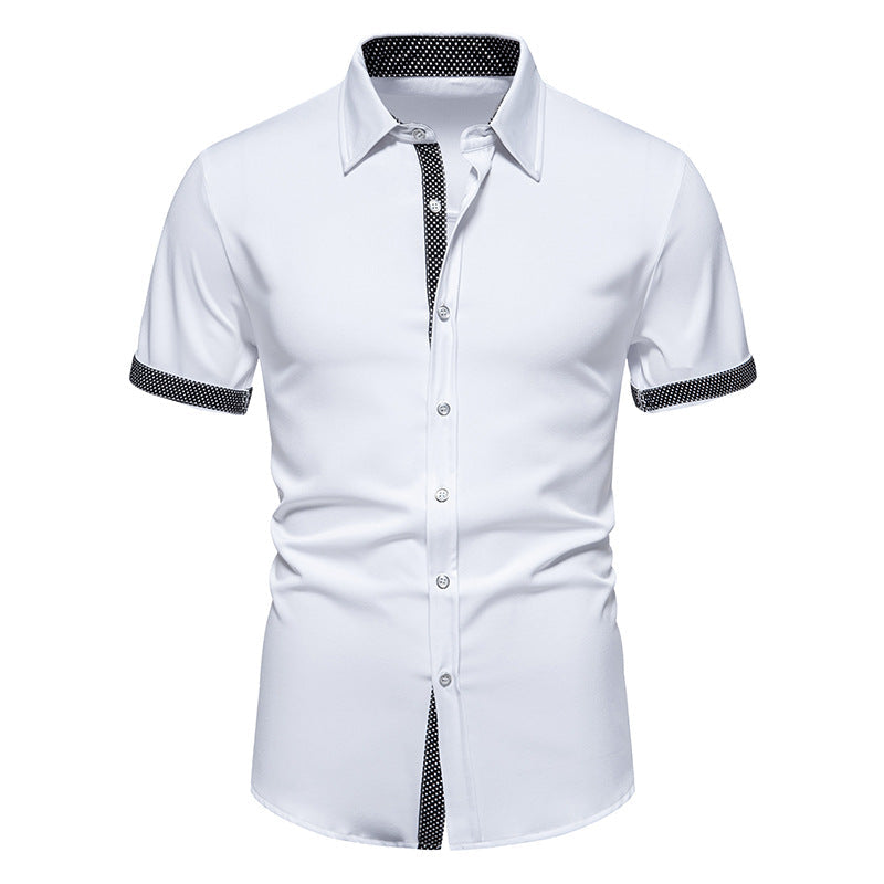 Stilvolles Herren Kurzarmhemd mit Polka-Dot Design und Kentkragen. Vielseitiges Sommerhemd für Freizeit und moderne Herrenmode.