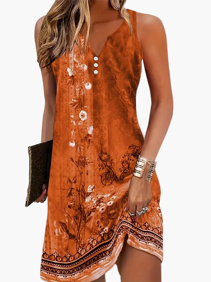 Komfortables Freizeitkleid für Damen, ärmellos, mit lebhaftem abstraktem Muster, für entspannte Sommertage.