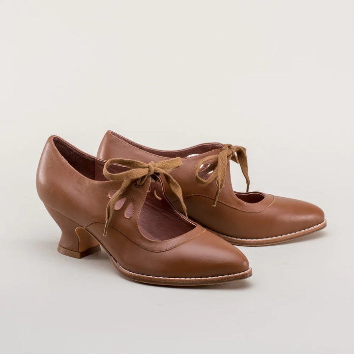 Schwarze Damen High-Heels mit Fußgewölbestütze und rutschfester Sohle. Elegante Pumps für Büro und Alltag.