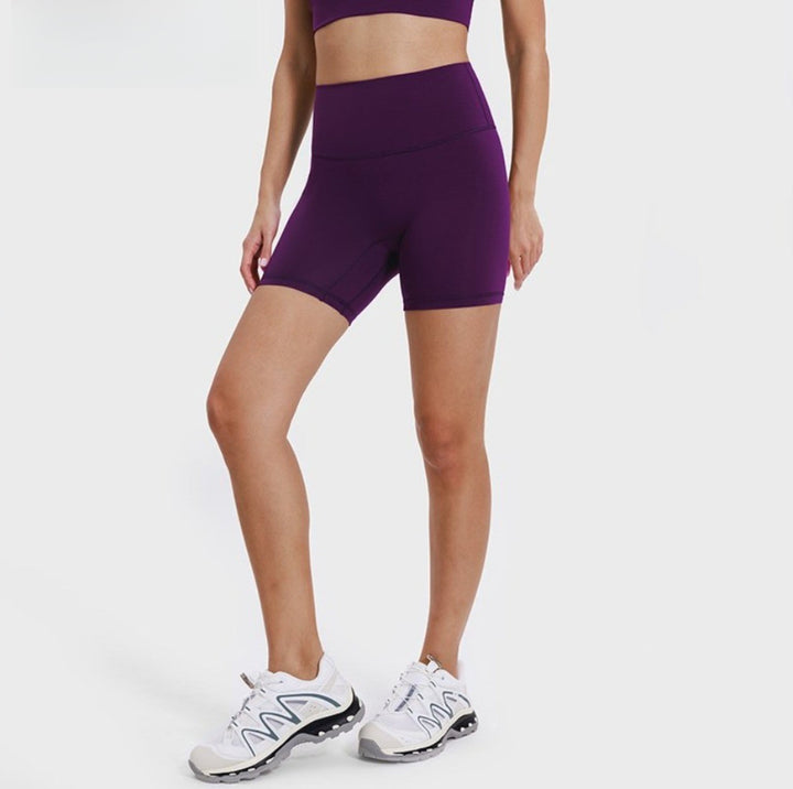 Graue Damen Yoga-Shorts, dehnbar und atmungsaktiv, ideal für entspannte Tage oder Sport.