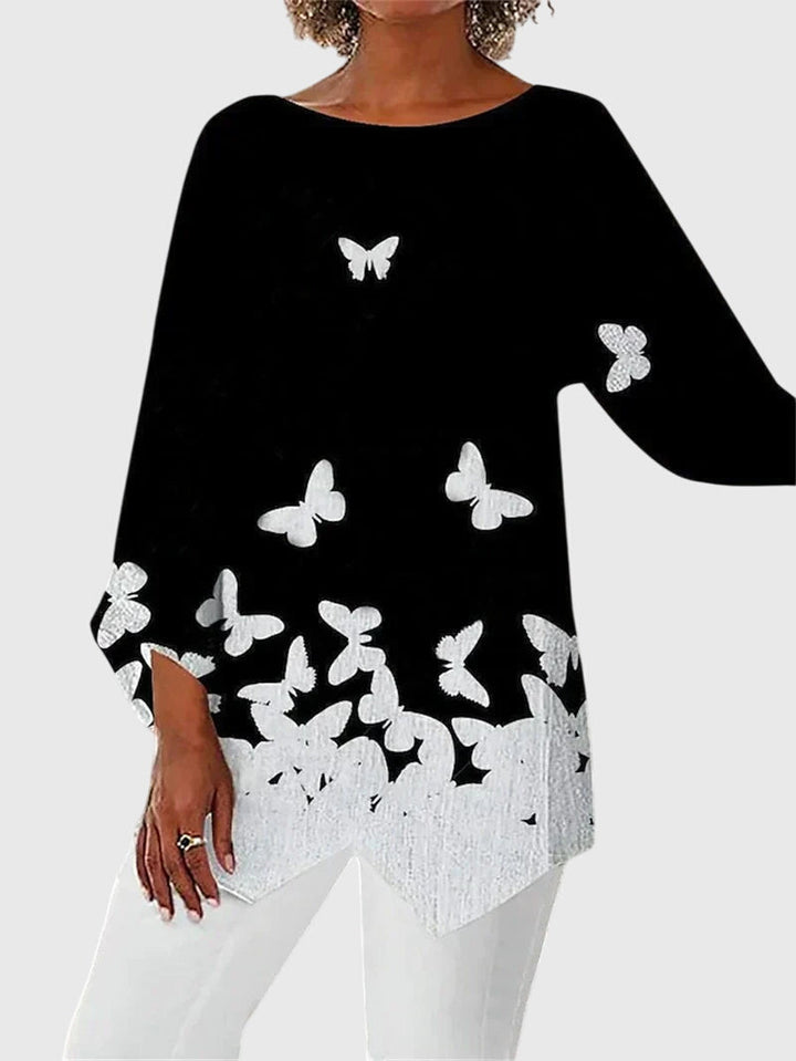 Damen Langarmtop mit Schmetterlingsmuster, ideal für elegante Freizeit-Outfits oder einen stilvollen Büro-Look.