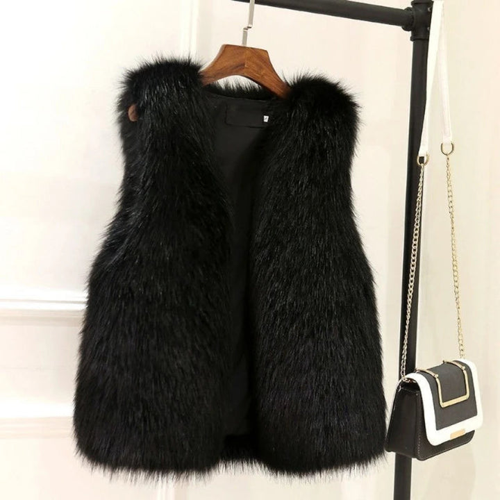 Stilvolle Damen Weste mit offener Front für Herbst & Winter. Lockere Passform, ärmellos, schwarze Farbe.