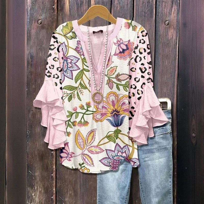 Lockere Damen-Blumenbluse mit Rüschen an den Ärmeln. Perfektes Oberteil für Frühling & Sommer, stilvoll & bequem.