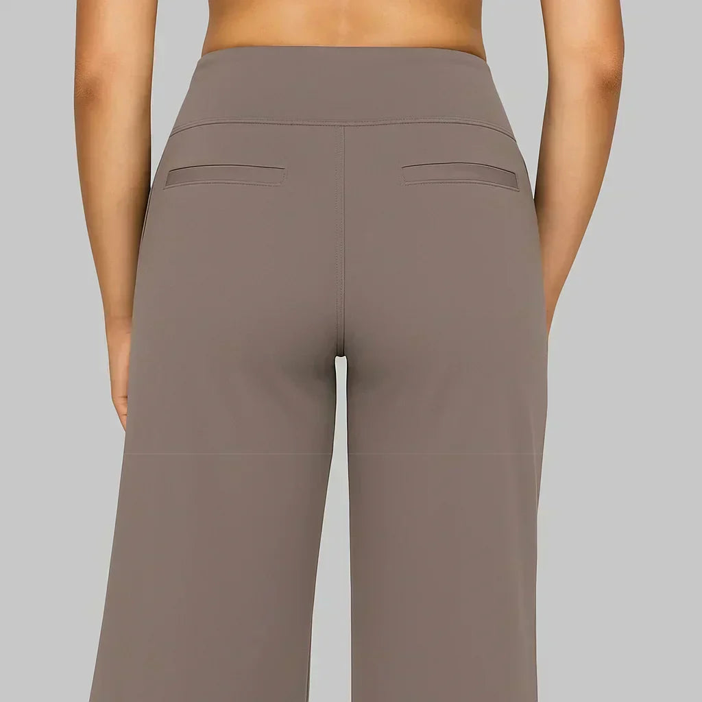 Schwarze Damen Slim Fit Hose, Stretch-Qualität, hoher Bund, modern und schmeichelnd, perfekter Sitz.