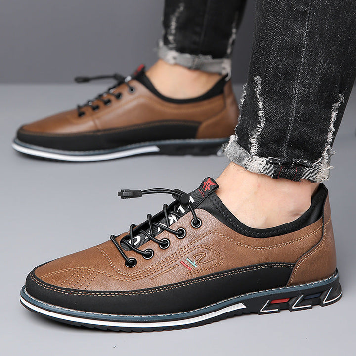 Schwarze Schnürschuhe für Herren mit robuster Gummisohle, langlebig & stilvoll.