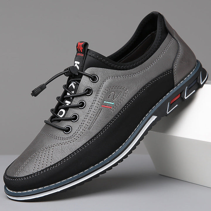 Moderne graue Herren-Sneaker, perfekt für Alltag & Freizeit, sportlich-elegant.