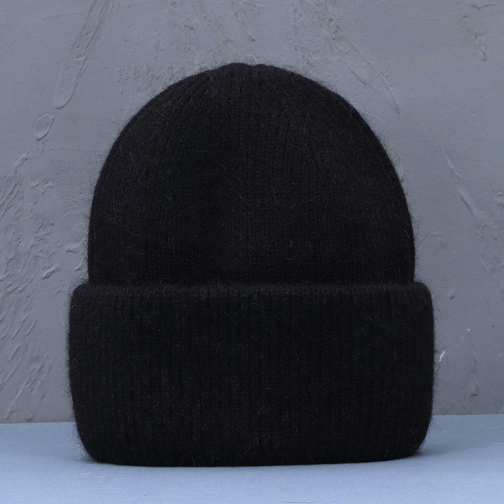 Warme Damen Wintermütze aus weichem Strick. Kuscheliger Beanie für optimalen Komfort an kalten Tagen.