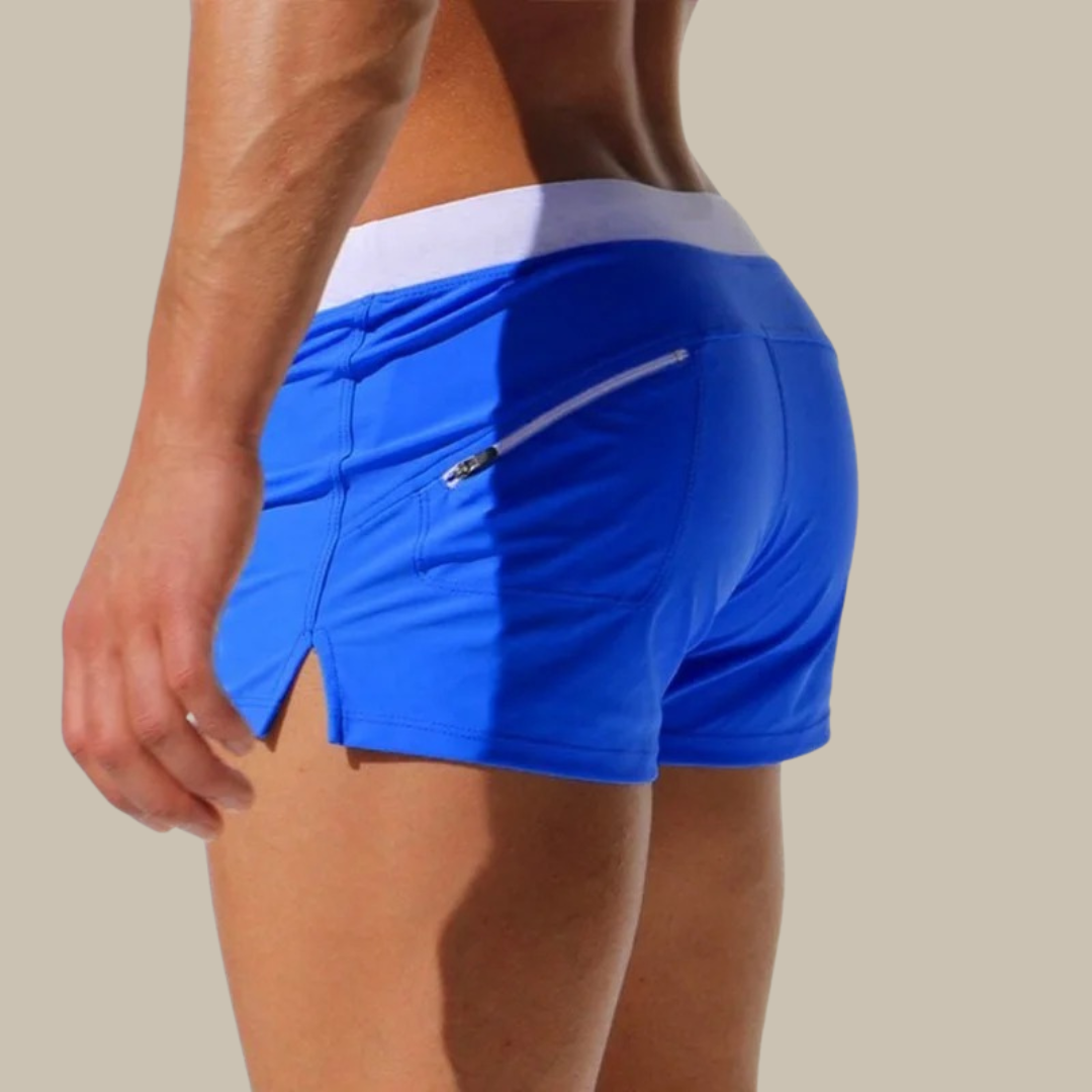 Kurze Herren Bademode aus schnelltrocknendem, dehnbarem Material für ultimativen Sommerkomfort.