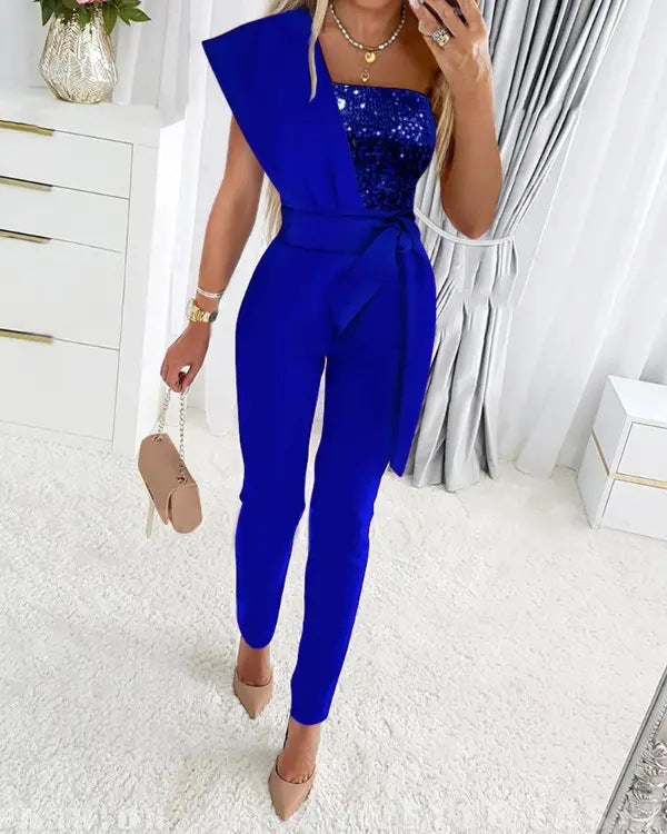 Figurbetonter Damen Fest-Jumpsuit, elegant und komfortabel, mit Glitzerakzenten für besondere Anlässe.