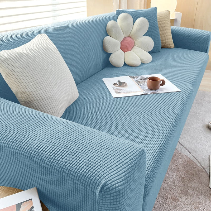 Praktische Schutzhülle für Sofa in Hellgrau. Waschbar, elastisch & bietet optimalen Möbelschutz.