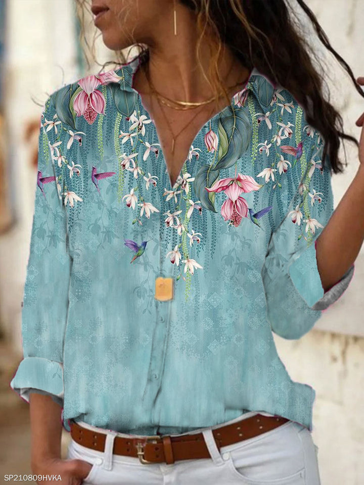Schicke Damen Frühlingsbluse, auch als Sommerbluse tragbar. Ein elegantes Langarm Oberteil für Damenmode.