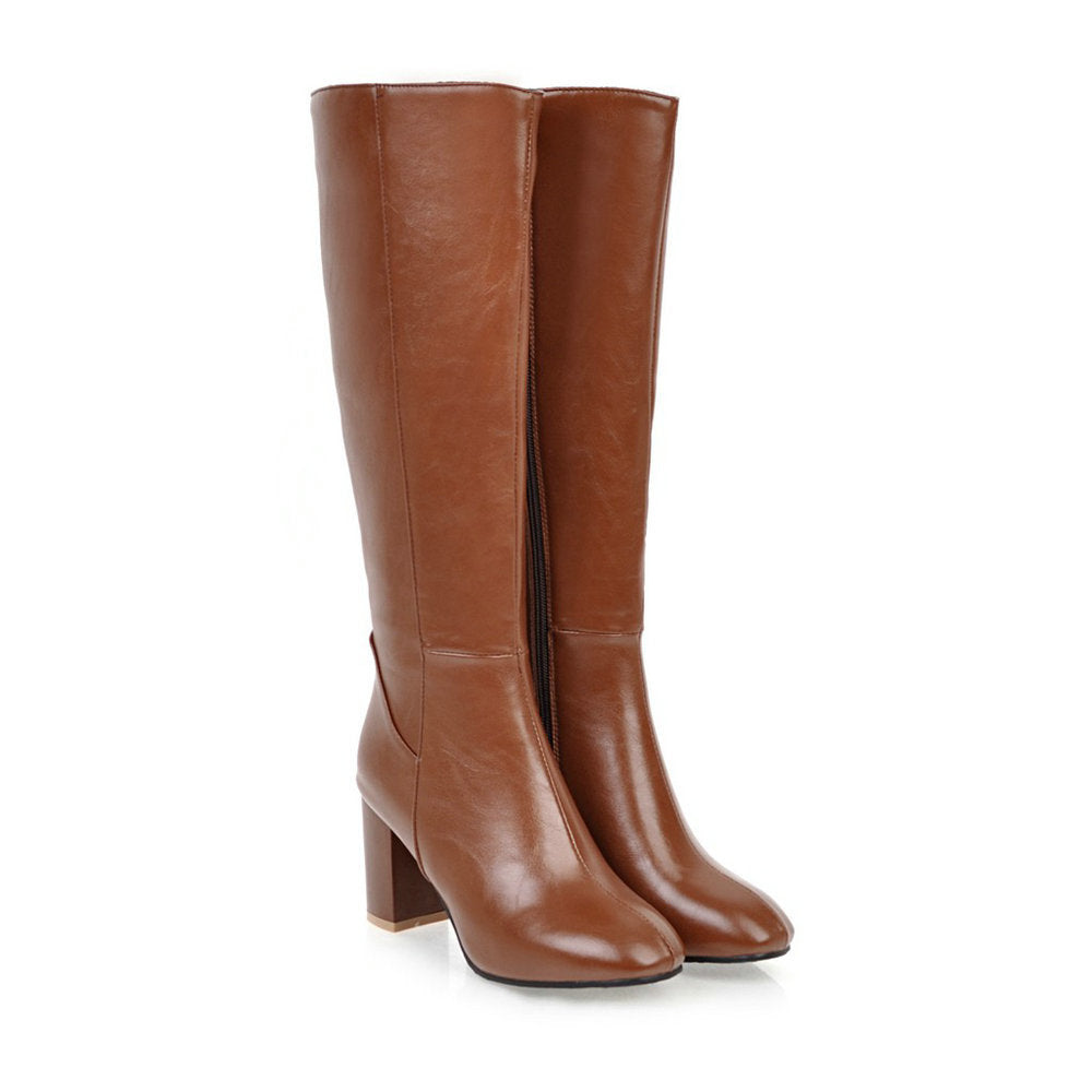 Zeitlose, elegante Damen Stiefeletten mit Reißverschluss. Edle Damenschuhe mit Blockabsatz, perfekt für modische Frauen.