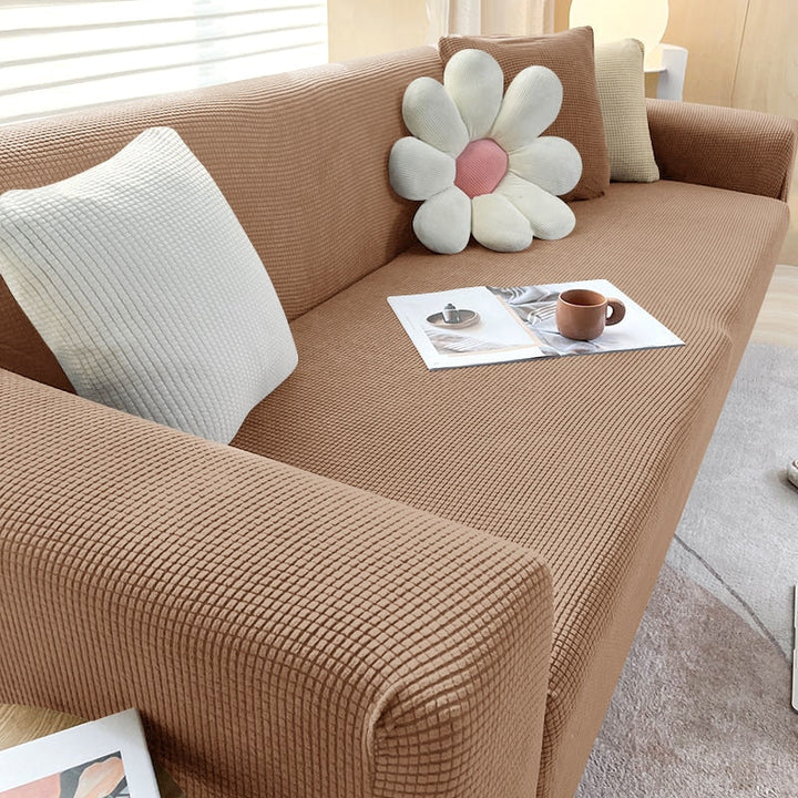 Moderner Couchbezug in Beige. Verwandelt Ihr Sofa, bietet Schutz & frische Wohnzimmerdeko.