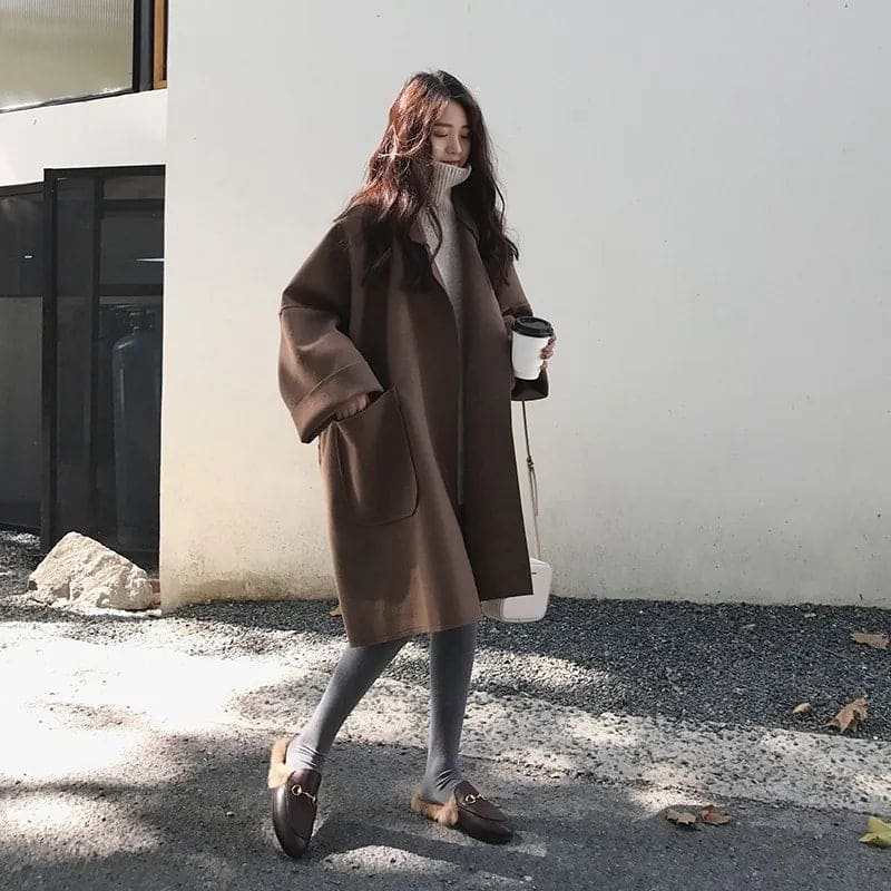 Modischer Oversized Trenchcoat. Perfekte Übergangsjacke für Herren & Damen, ideal für Herbstmode & Frühling.