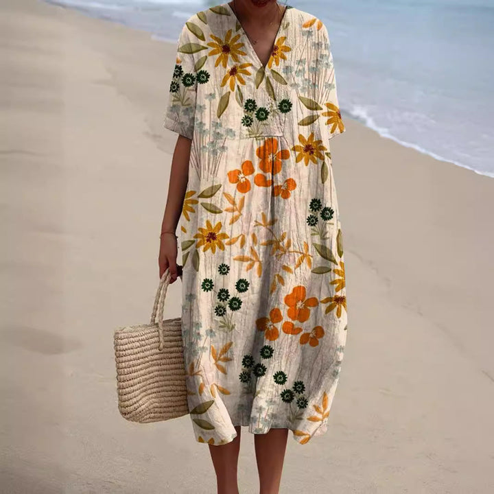 Stylisches Freizeitkleid Talia für Damen, mit Blumenmuster, V-Ausschnitt & hohem Tragekomfort.
