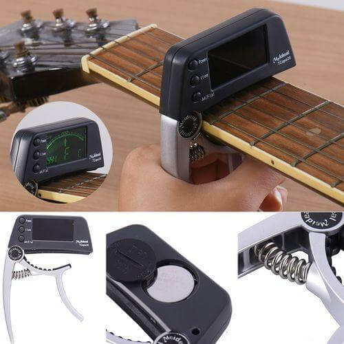Tragbares Gitarren Capo & Tuner aus robustem Aluminium, unverzichtbares Musikzubehör für jeden Musiker.