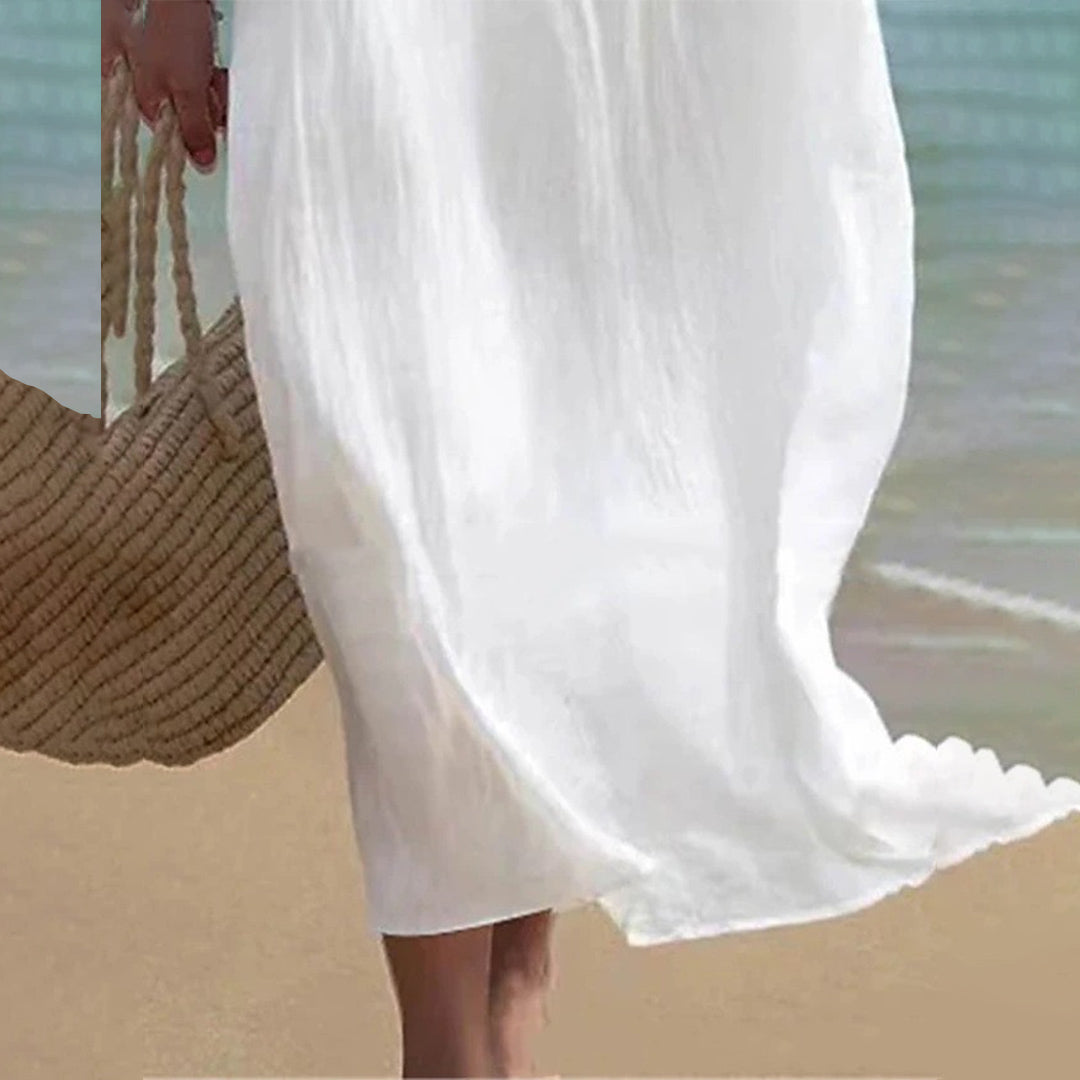 Modisches weißes Sommerkleid, Midilänge, ärmellos und elegant mit betonter Taille. Vielseitig für Party & Freizeit.