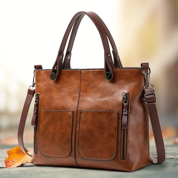 Moderne braune Damen Handtasche aus PU-Leder, vielseitig als Schulter- und Crossbody Tasche.