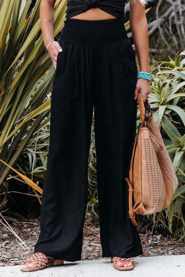 Stylische Damen High-Waist Hose mit weitem Bein, ideal für Business Casual und Freizeit.