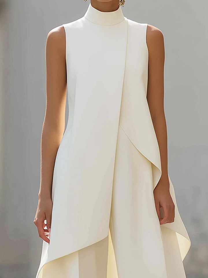 Stilvoller Damen Zweiteiler: asymmetrisches Oberteil & Hose mit weitem Bein für ein modernes Büro-Outfit.