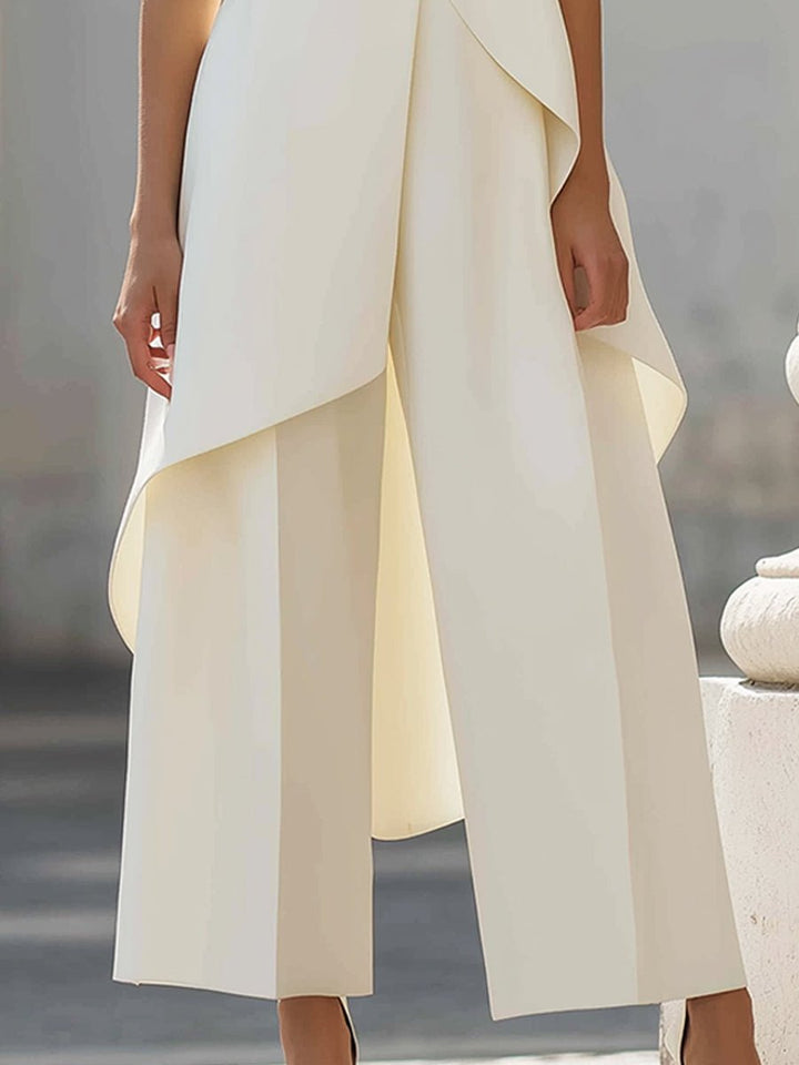 Moderner Damen Business-Set mit hohem Kragen, ärmellosem Top & weiter Hose; elegant und stilvoll.