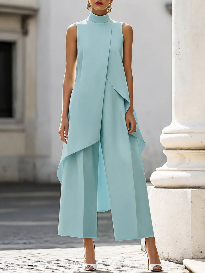 Damen Outfit: Eleganter Zweiteiler mit asymmetrischem Saum & weitem Bein, perfekt für Büro und Abendmode.