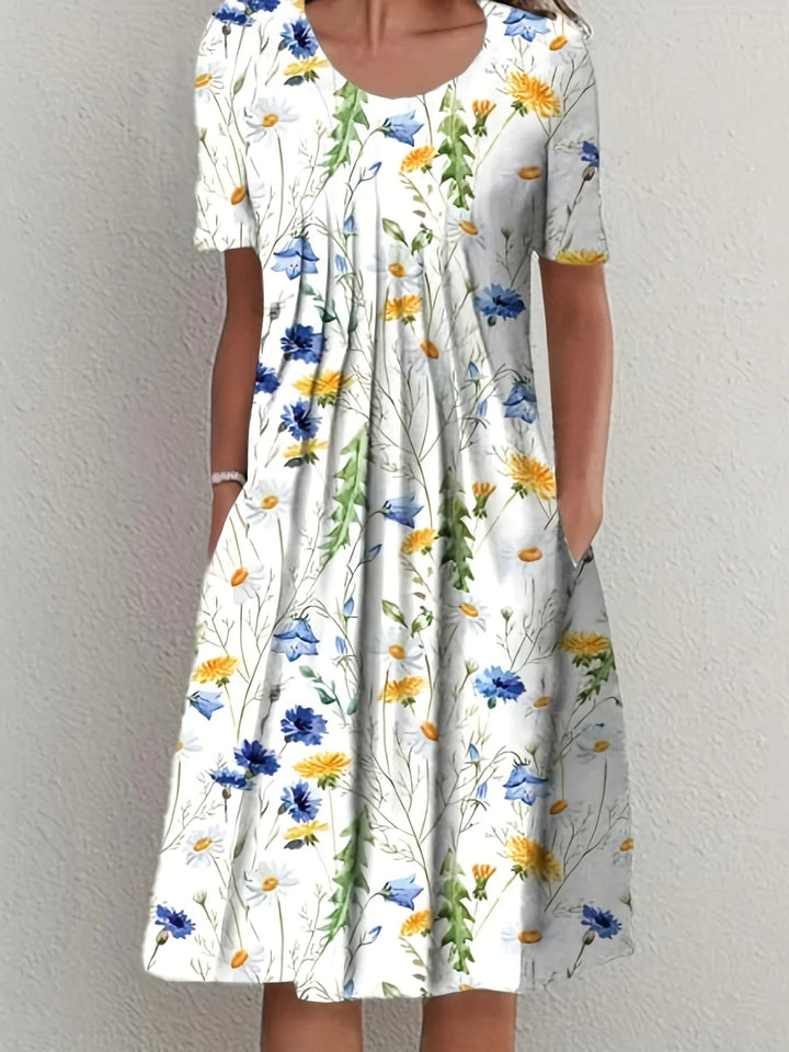 Elegantes Damen Blumenkleid mit kurzen Ärmeln. Ideal für Frühling & Sommer Partys, bequem und stilvoll.