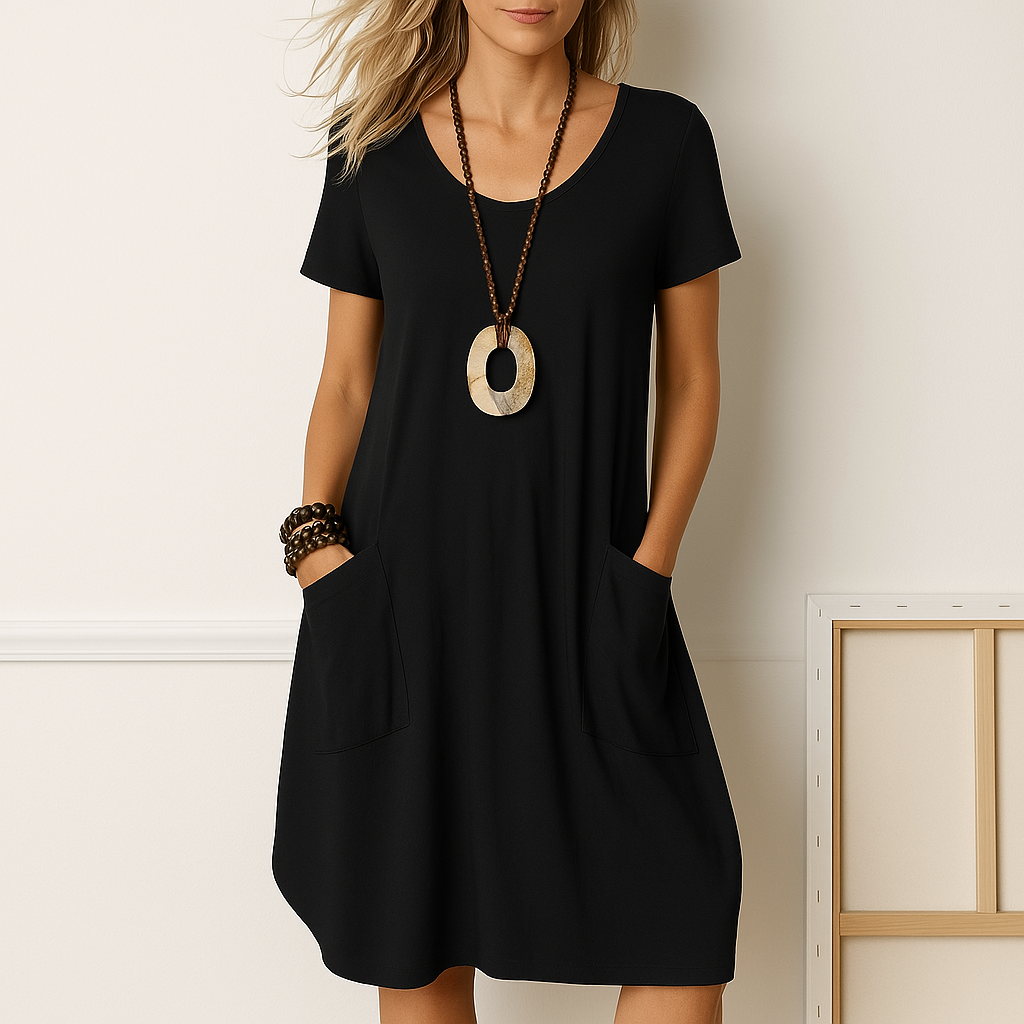 Bequemes Damen Kurzarm Sommer Midikleid mit lockerer Passform und nützlichen Taschen. Ideal als Strand- oder Freizeitkleid.