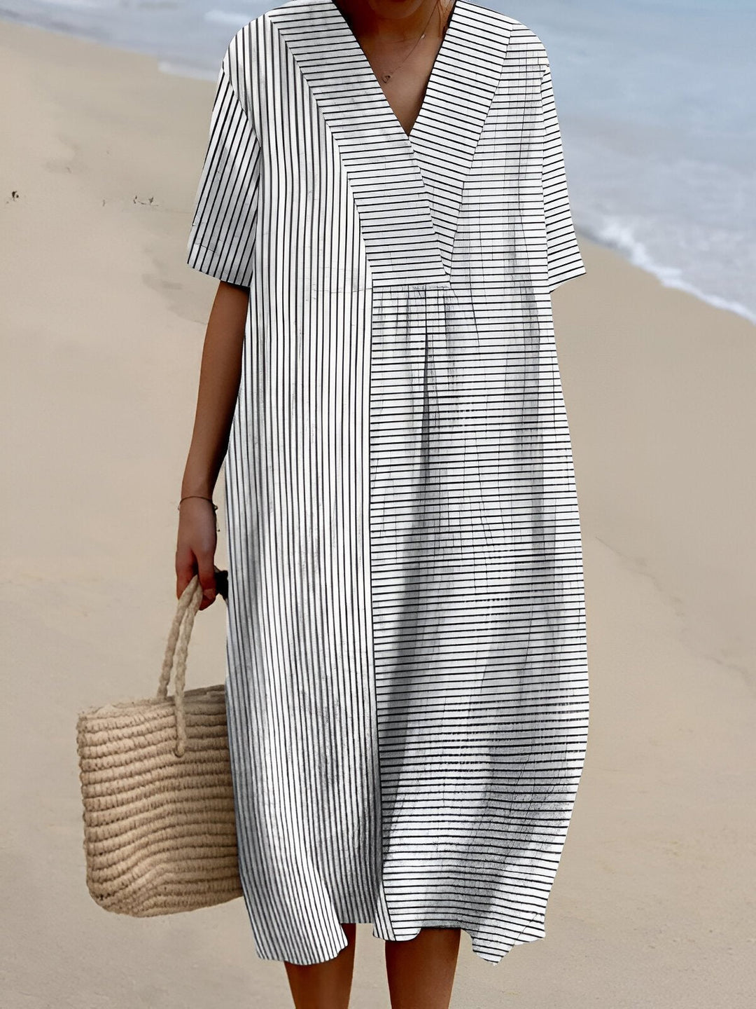 Damen Boho Midi-Sommerkleid mit V-Ausschnitt & kurzen Ärmeln, ideal für entspannte Urlaubstage.