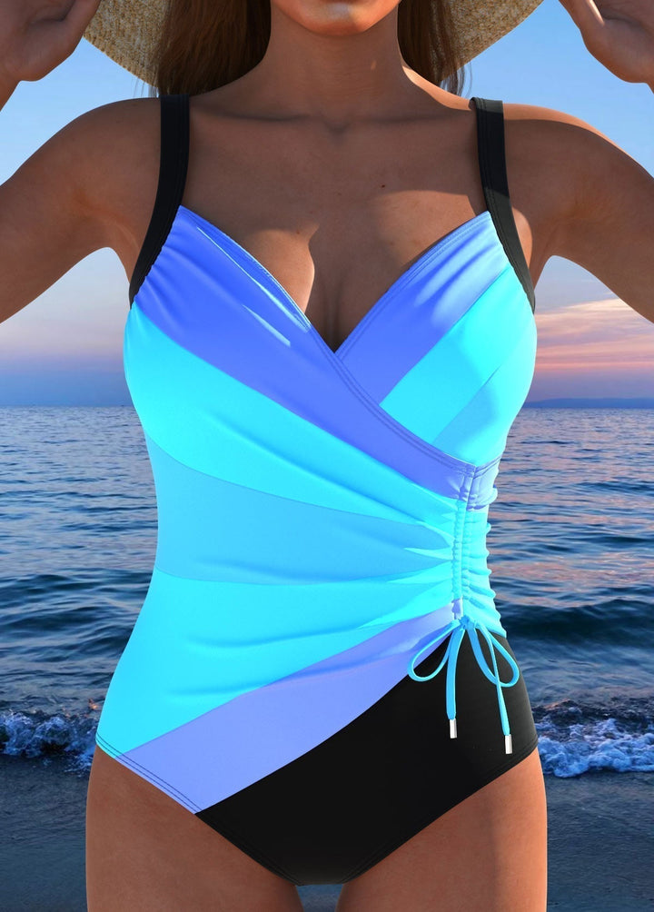 Bequemer Damen Badeanzug, einteilig, mit verstellbaren Trägern und farbigem Print. Perfekt für Wassersport.
