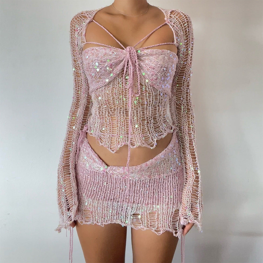 Glitzernder Damen Netz Minirock mit Pailletten, kombiniert mit Crop Top für Club & Party.