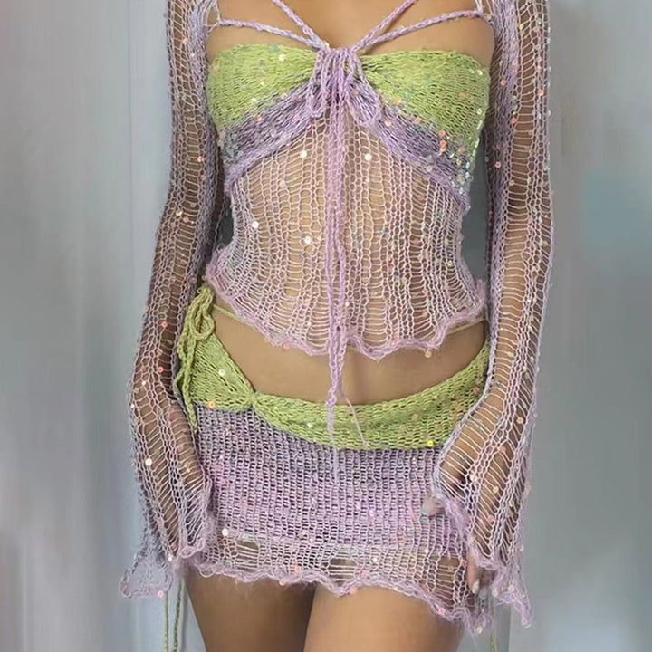 Vielseitiger Damen Party Zweiteiler: Netzoptik Crop Top & Minirock für den extravaganten Auftritt.
