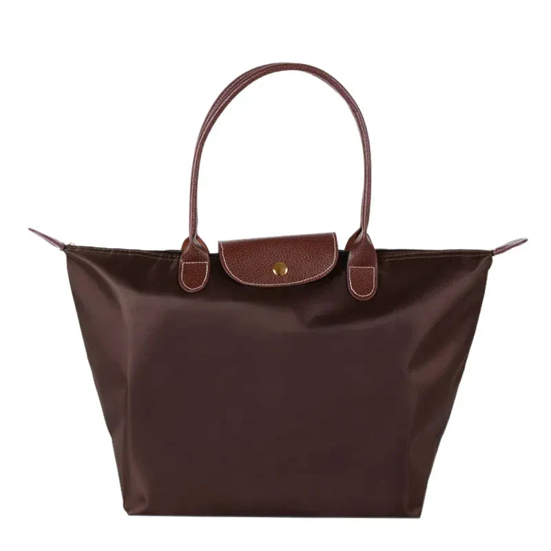 Geräumige Damen Handtasche für Organisation, elegante Alltagstasche aus Kunstleder für alle Essentials.