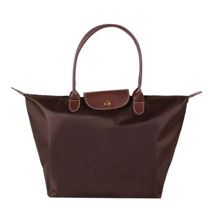 Geräumige Damen Handtasche für Organisation, elegante Alltagstasche aus Kunstleder für alle Essentials.