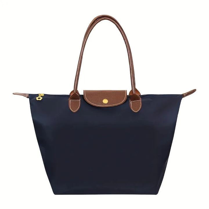 Trendige Damen Handtasche, modisches Kunstleder Accessoire. Stilvolle Alltagstasche für Eleganz & Organisation.