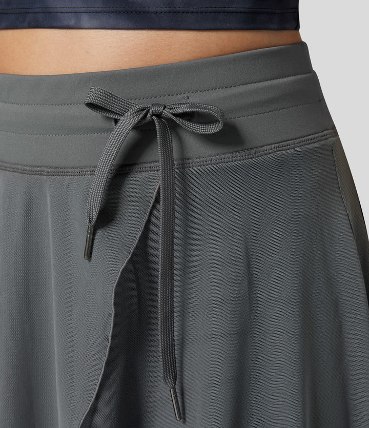 Eleganter Damen-Frühlingsrock, fließend, hochtailliert, ideal für stilvolle Auftritte.