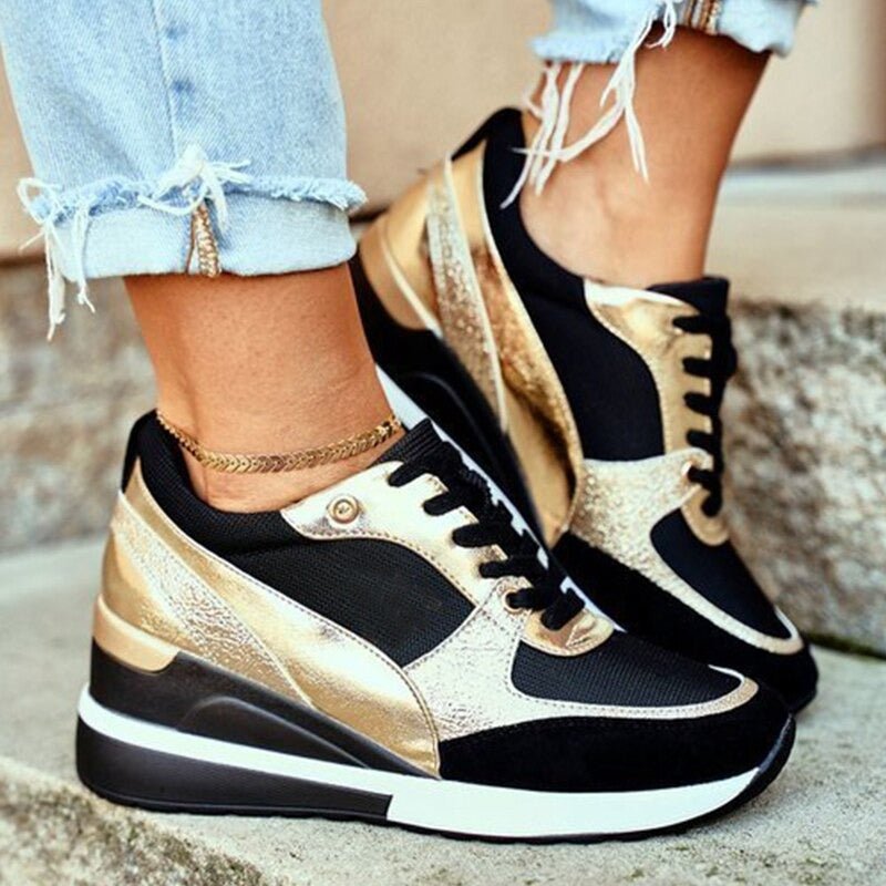 Damen Komfort-Sneaker in Schwarz mit orthopädischen Sohlen für gesunde Füße und bequemes Gehen.
