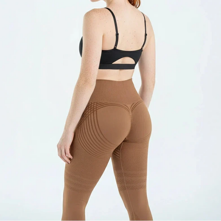 Seitliche Ansicht: High Waist Damen Kompressions-Leggings, figurbetont & elastisch für perfekte Passform.