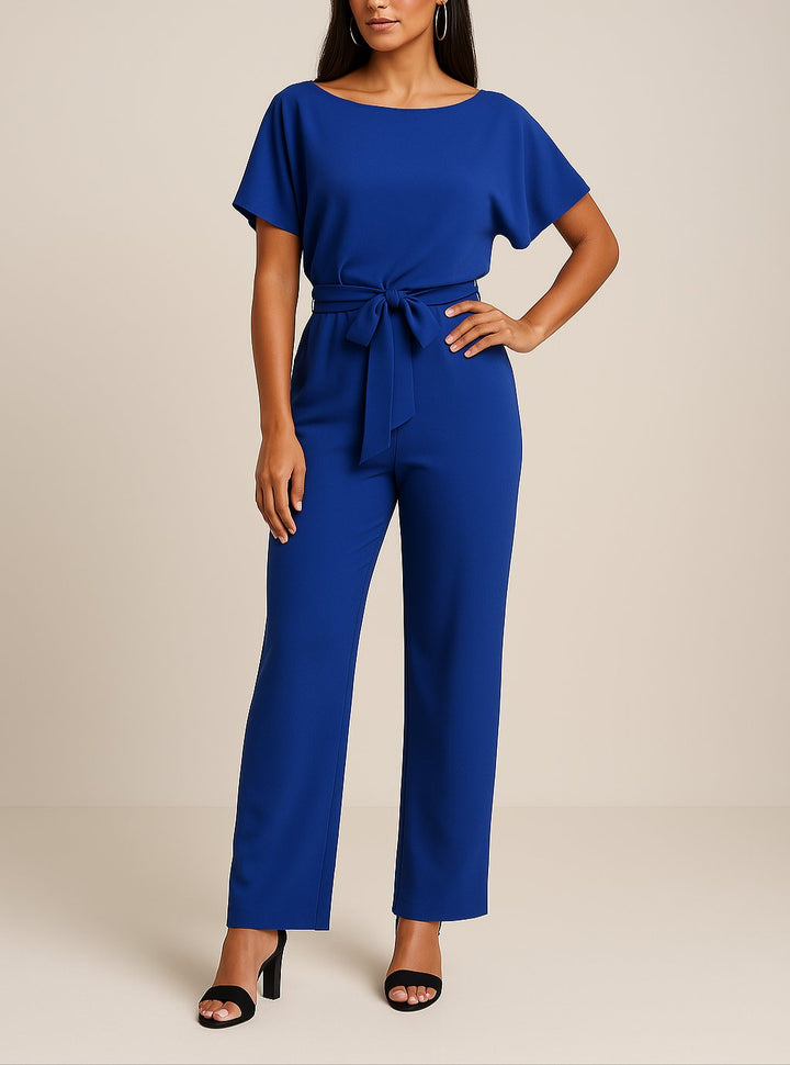 Komfortabler Damen Jumpsuit, leicht & atmungsaktiv, mit weitem Bein & Bindegürtel. Dein modisches Statement.