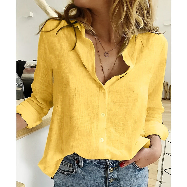 Moderne Damen Sommerbluse mit stylischer Knopfleiste und langen Ärmeln, lässig und elegant zugleich.